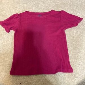 Little girls pink shirt.